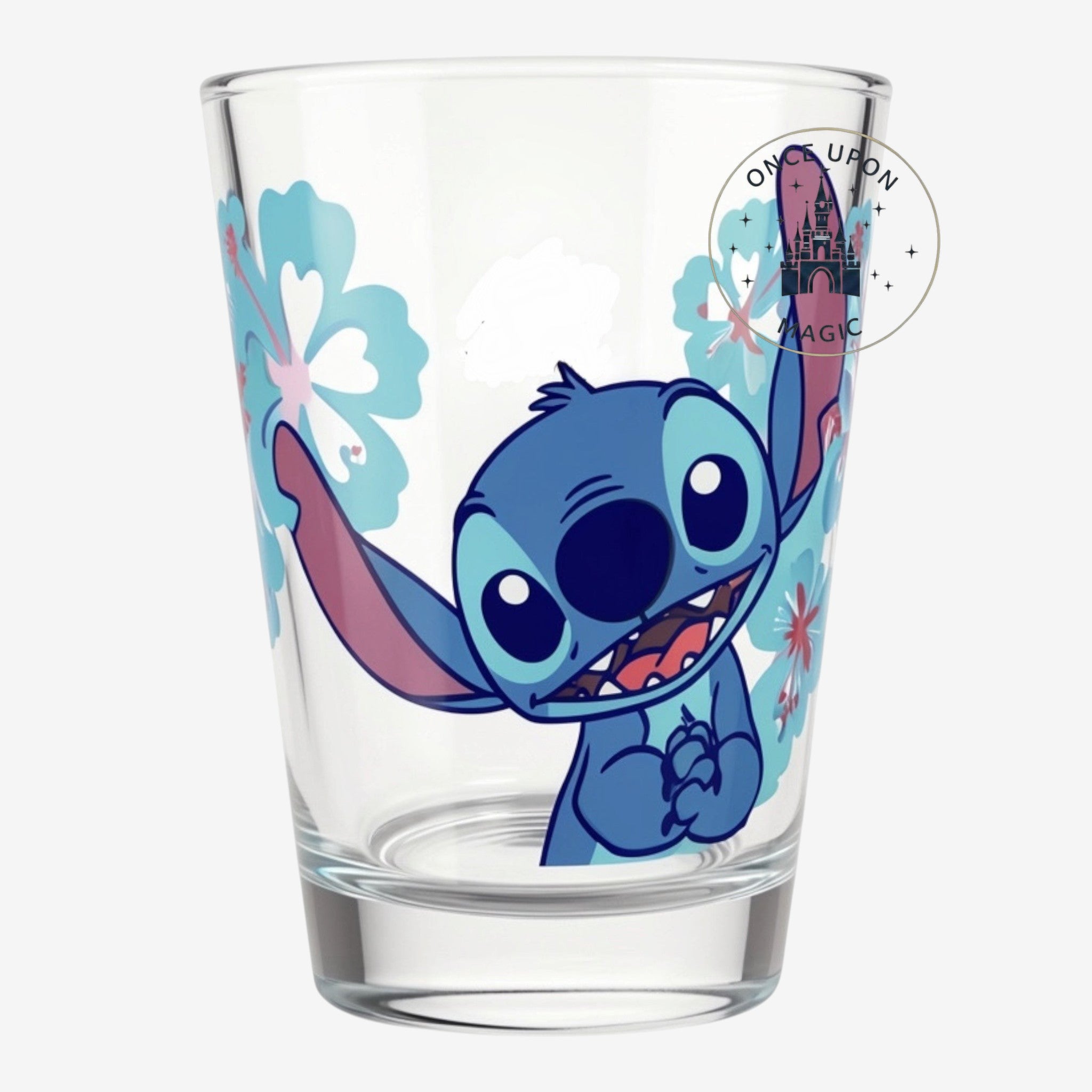 Verre Once Upon Magic avec portrait de Stitch et motifs de fleurs tropicales bleues sur fond transparent