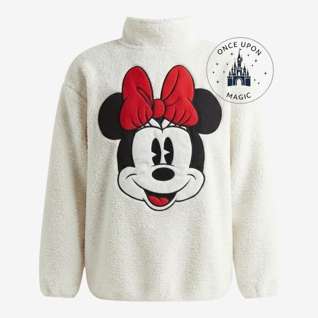 Veste polaire blanche femme Once Upon Magic avec Minnie Mouse et son nœud rouge, col montant, matière douce.