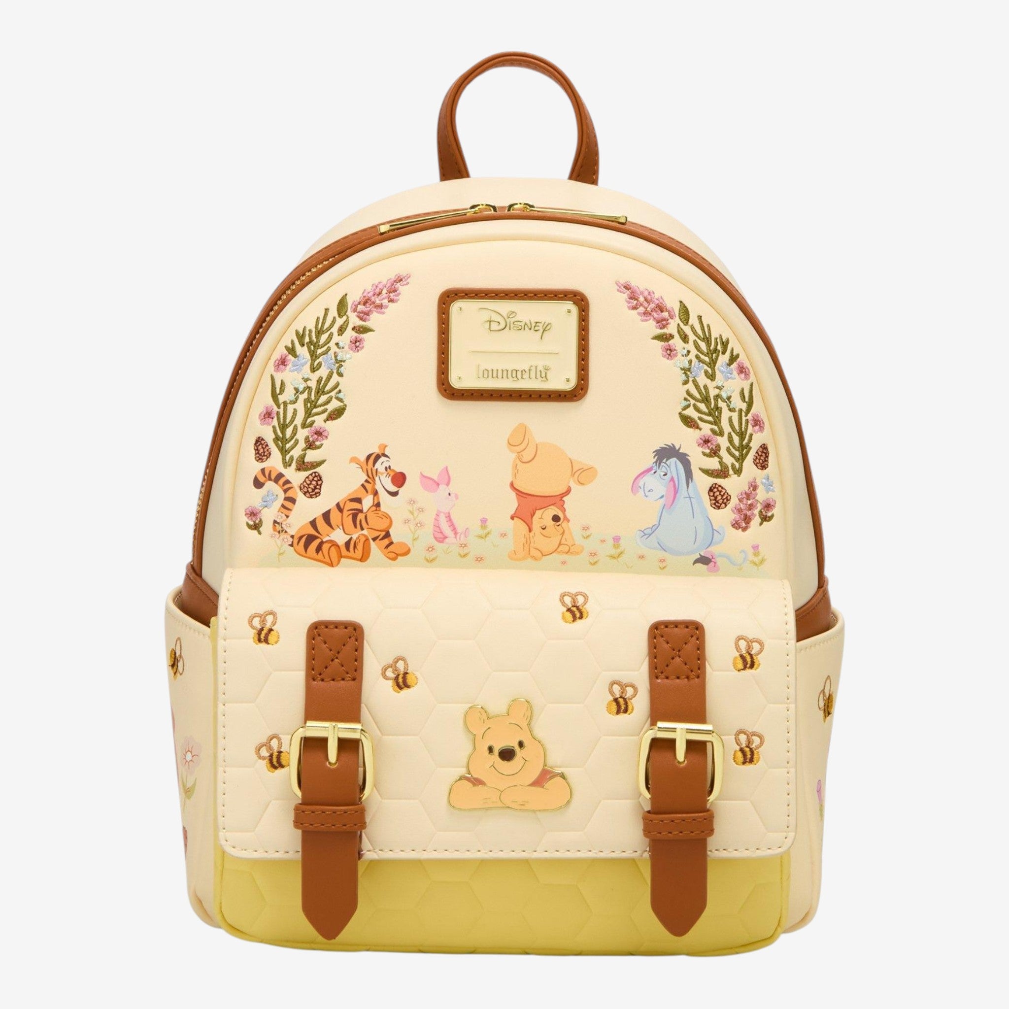 Once Upon Magic Winnie the Pooh and Friends faux leather backpack with honeycomb pattern, floral embroidery, and character graphics.