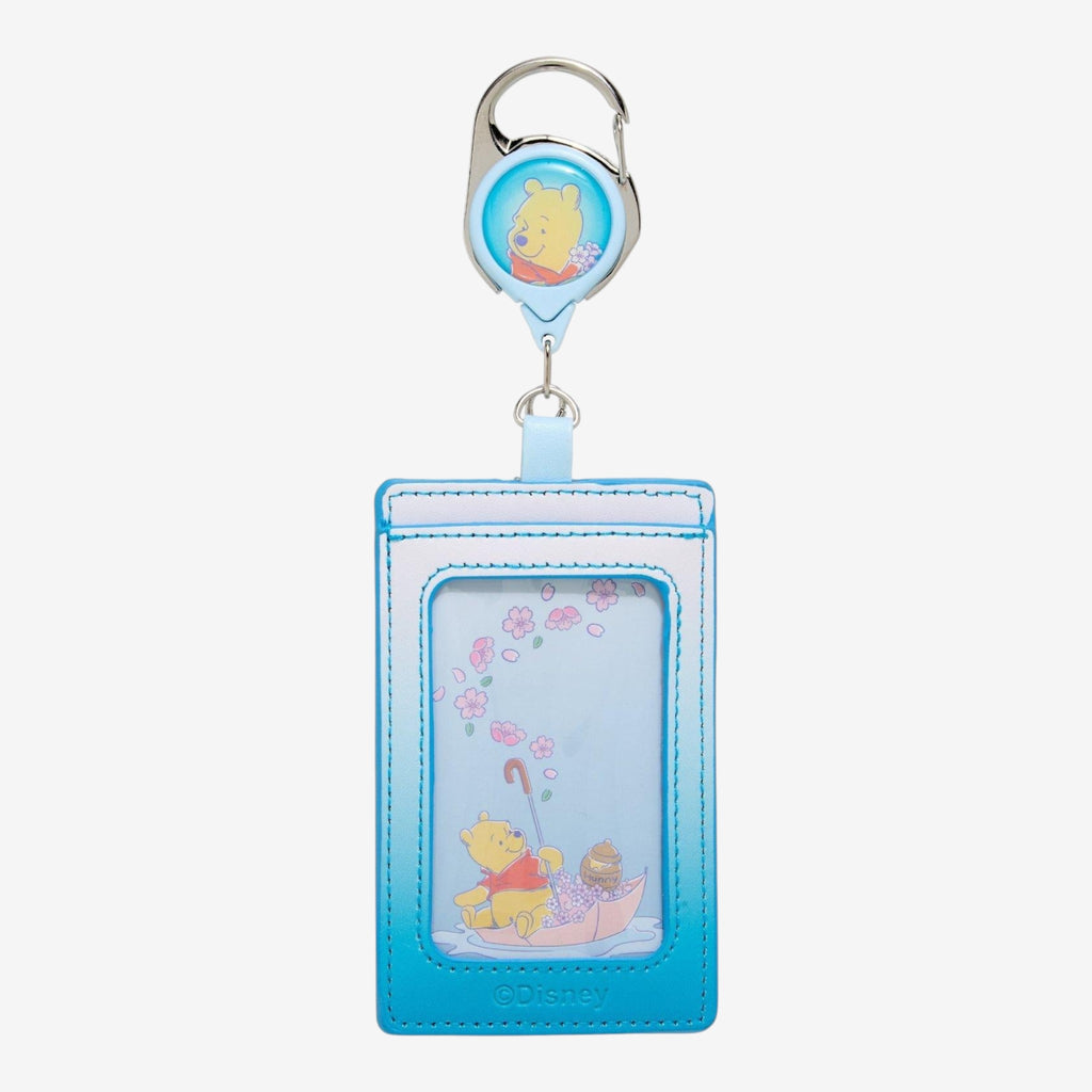Once Upon Magic Winnie the Pooh Sakura retractable lanyard with charm, pastel blue and pink.