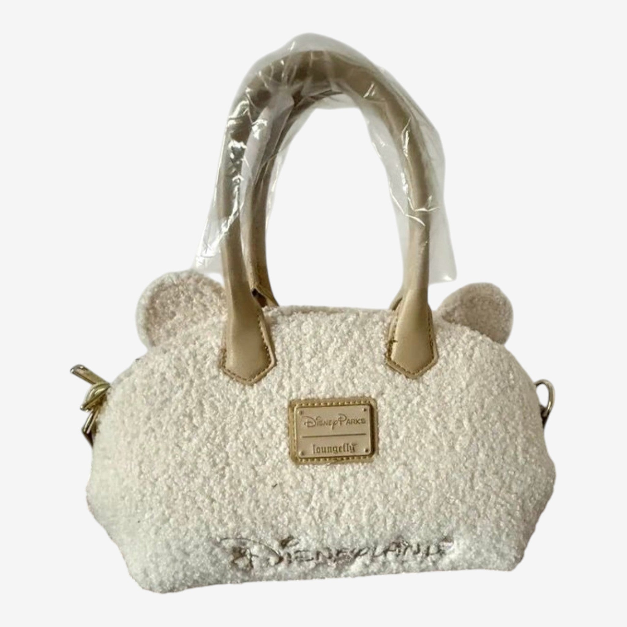 Once Upon Magic cream sherpa Winnie the Pooh mini duffel bag with bear ears and embroidered Disneyland Paris logo.
