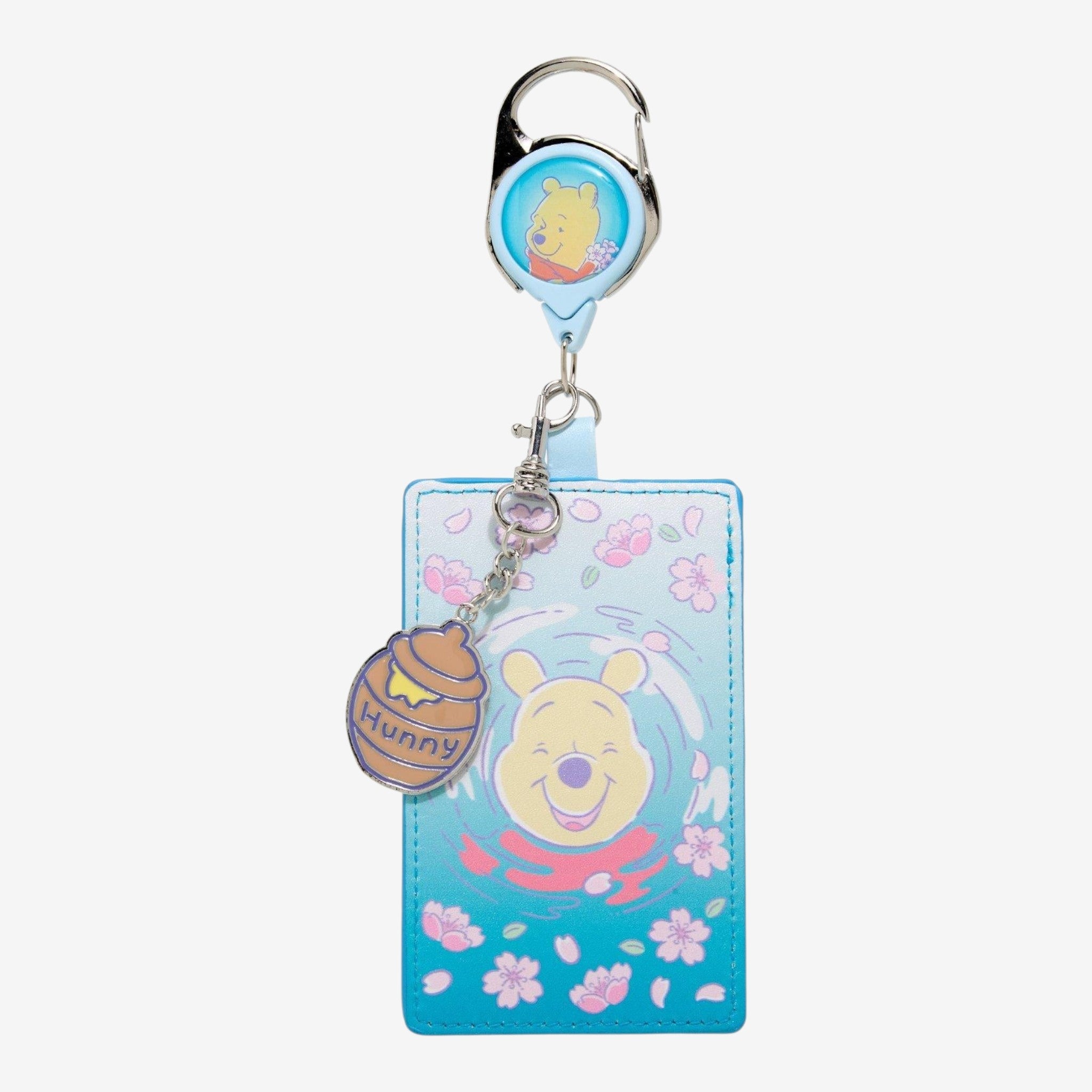 Once Upon Magic Disney Winnie the Pooh Sakura retractable lanyard with honey pot charm. Pastel pink and blue.