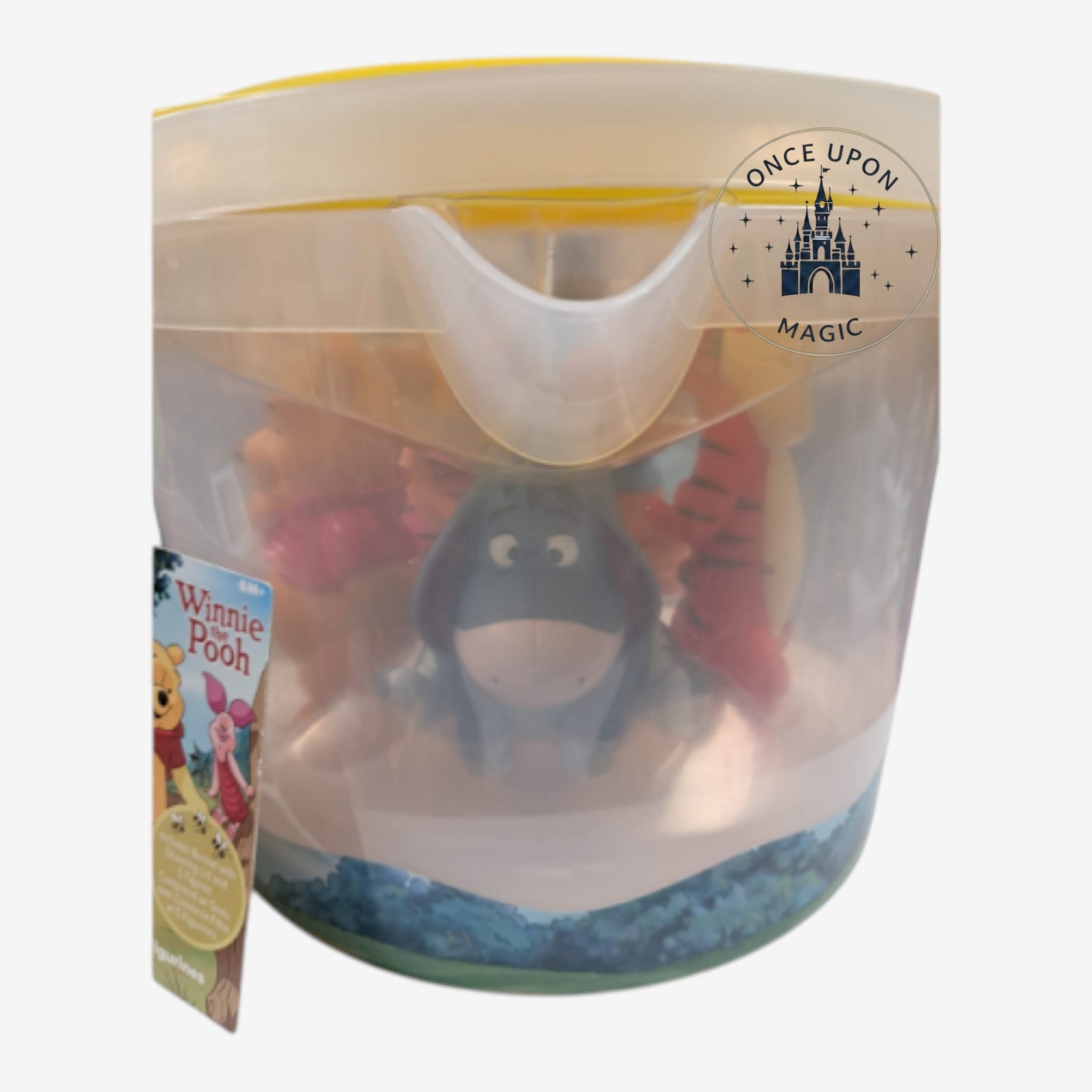 Once Upon Magic Winnie the Pooh character figurines inside a clear plastic storage bucket with a yellow lid.
