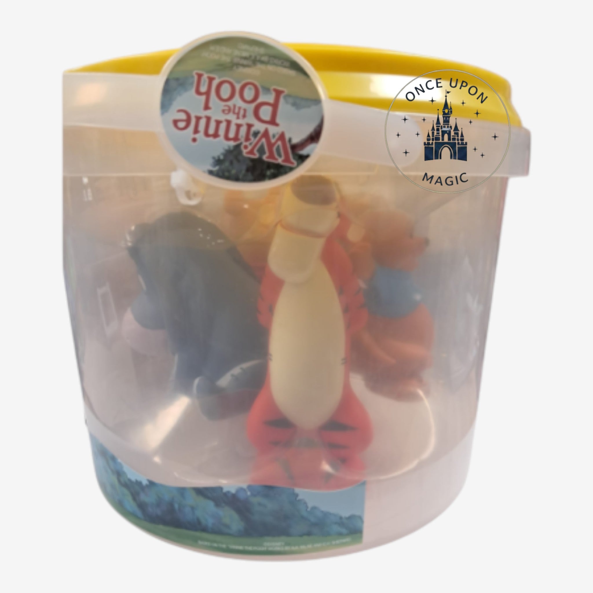 Once Upon Magic Winnie the Pooh character figurine set inside a clear plastic storage bucket with a yellow lid