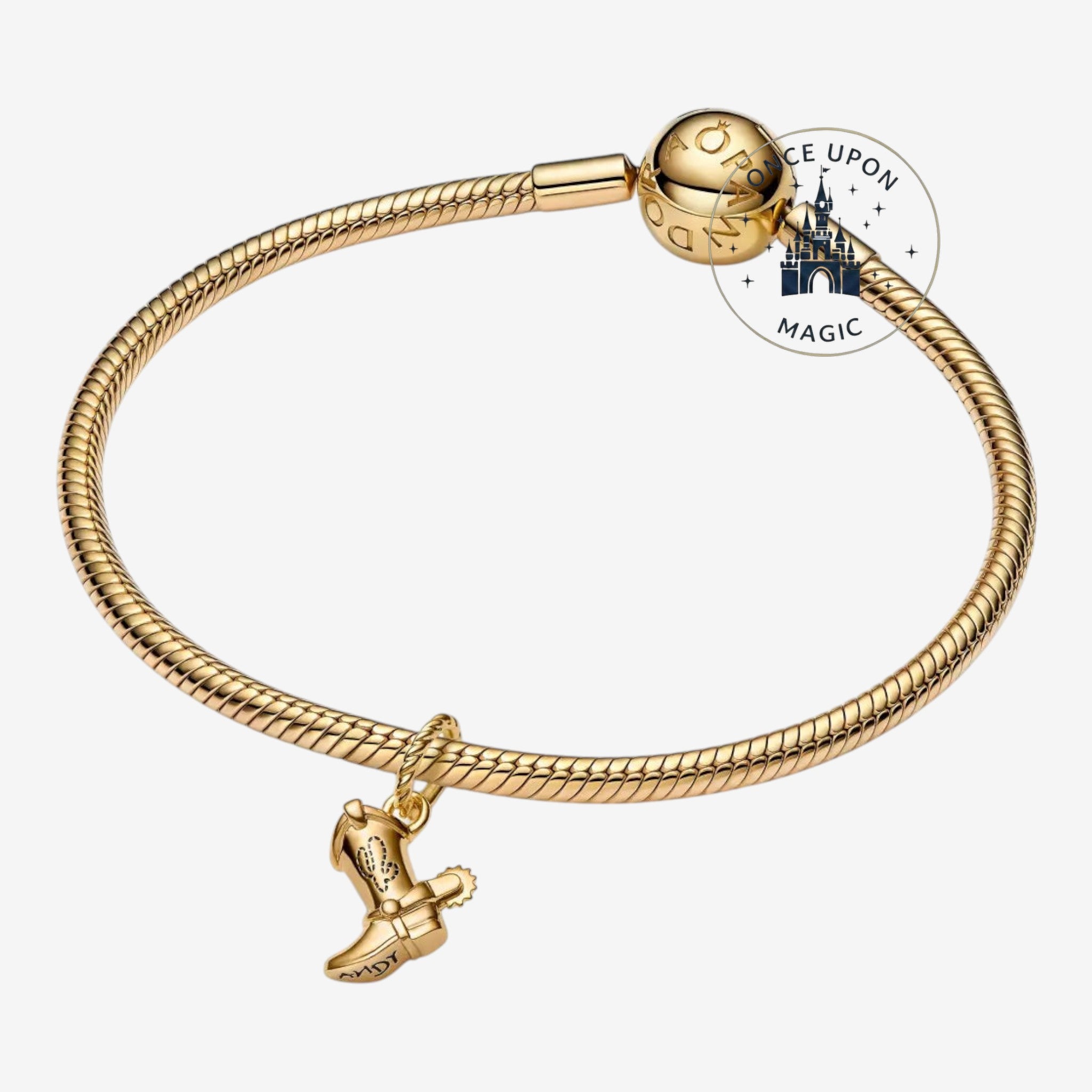 Once Upon Magic gold-tone charm bracelet with a Woody boot charm engraved with Andy.