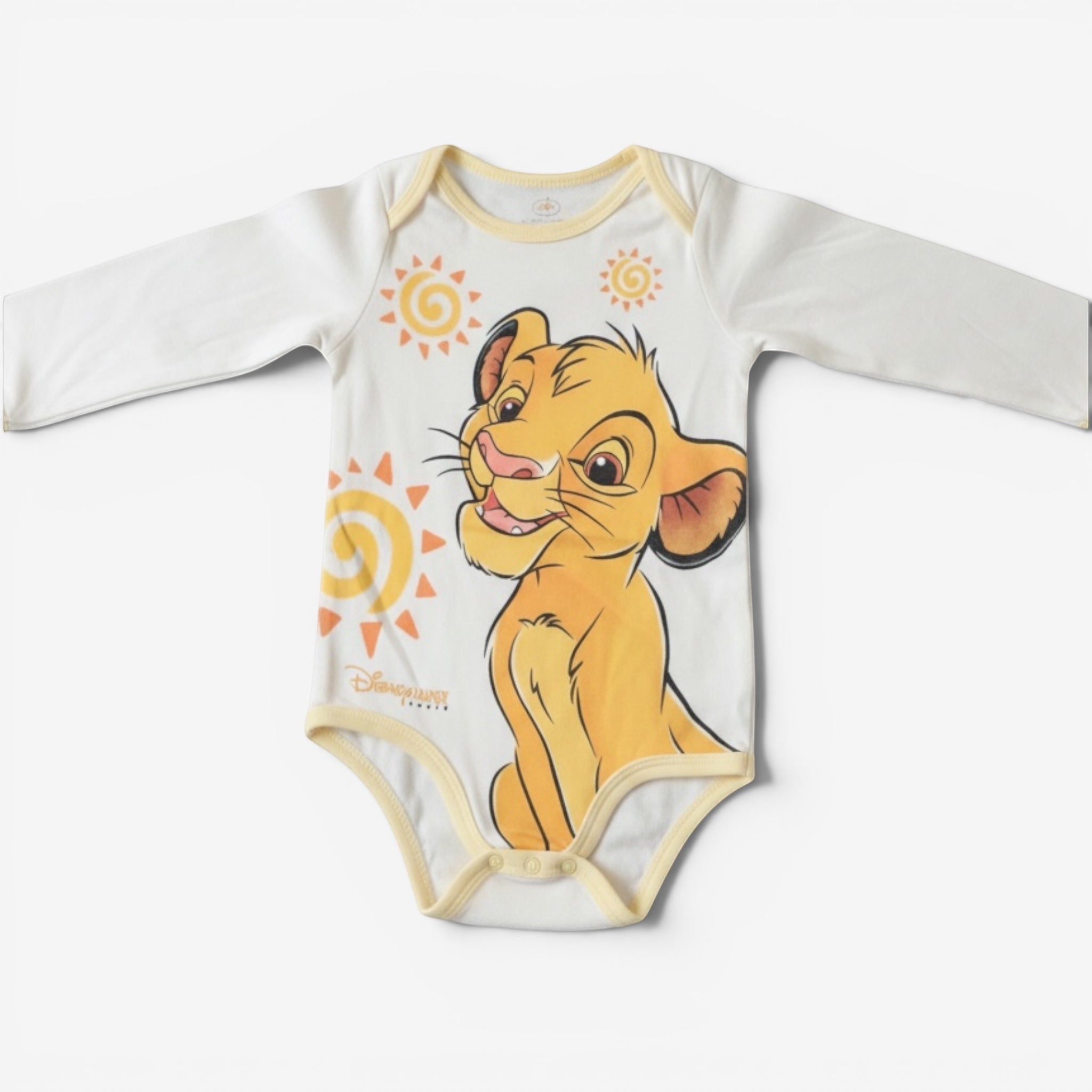 Once Upon Magic white long-sleeve baby bodysuit with Simba illustration and yellow trim. Features cartoon Simba and sun graphics.