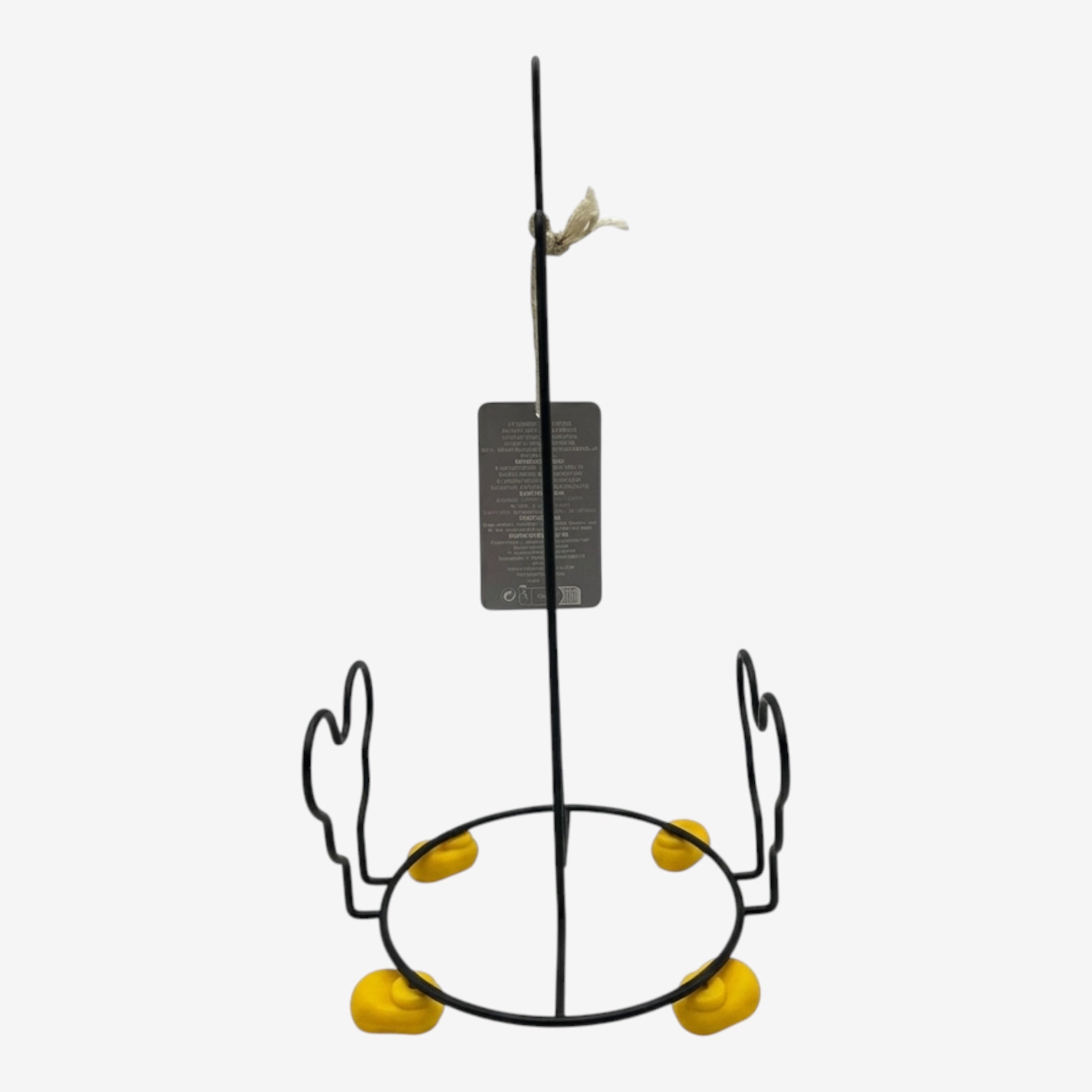 Once Upon Magic black metal paper towel holder with yellow feet accents. Decorative kitchen accessory.