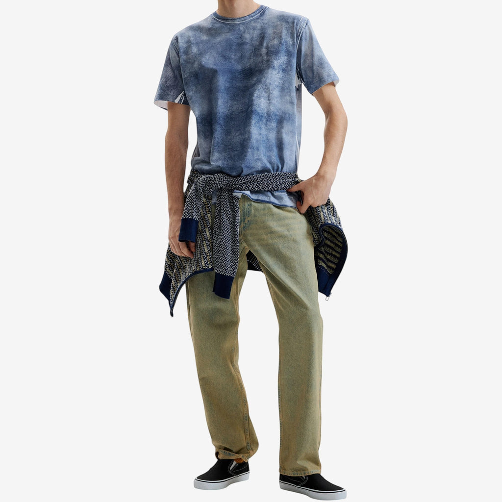 Once Upon Magic x Disneyland Paris blue tie-dye cotton t-shirt worn by a man.