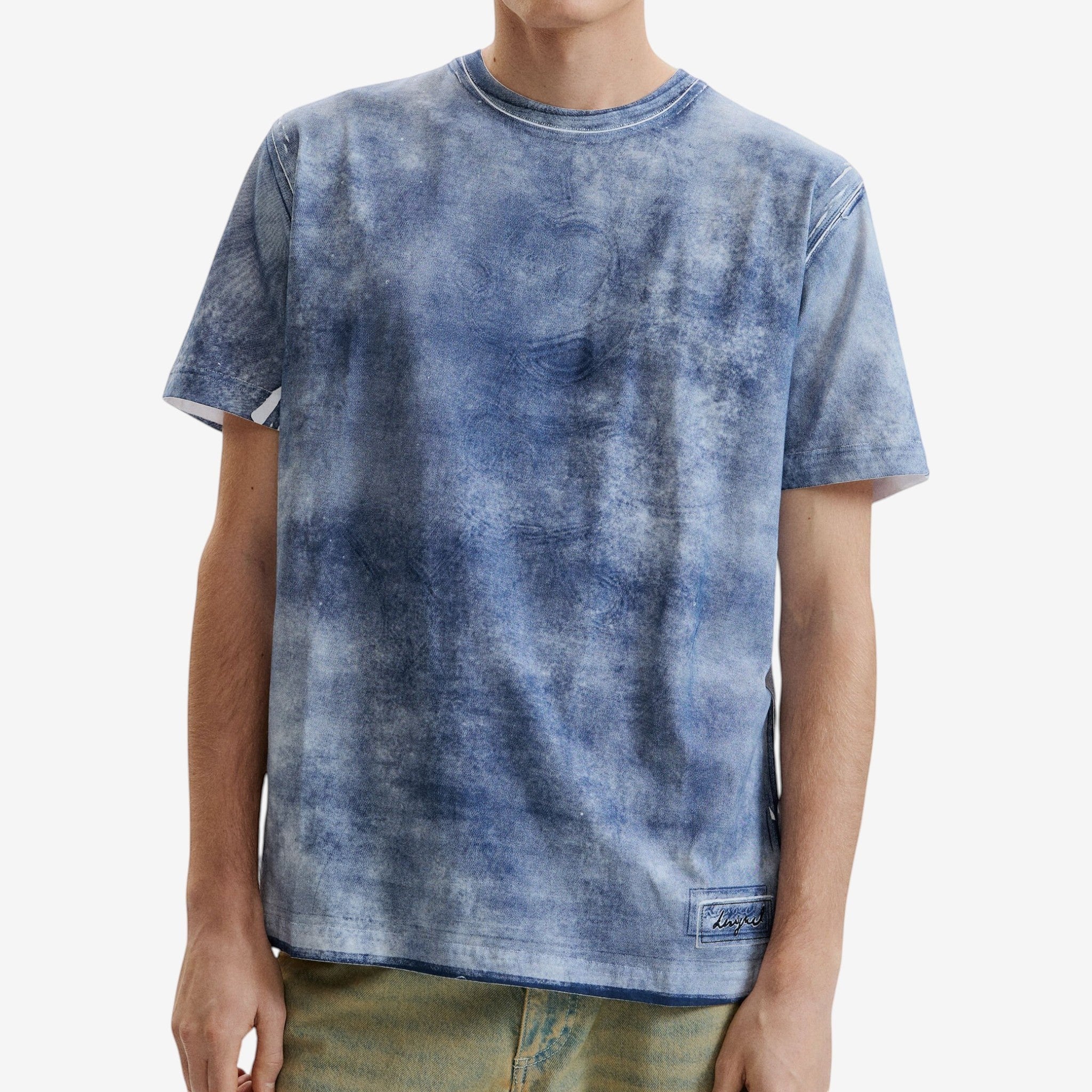 Once Upon Magic x Disneyland Paris blue tie-dye cotton t-shirt with crew neck and short sleeves.