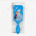 Brosse à cheveux bleue La Reine des Neiges avec Elsa et Anna, design hivernal, idéale pour enfants.