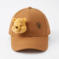 Once Upon Magic brown cotton baseball cap with 3D Winnie the Pooh face and embroidered bee detail.