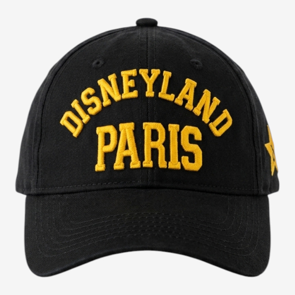 Casquette noire Once Upon Magic avec broderie jaune "Disneyland Paris" et étoile sur le côté.