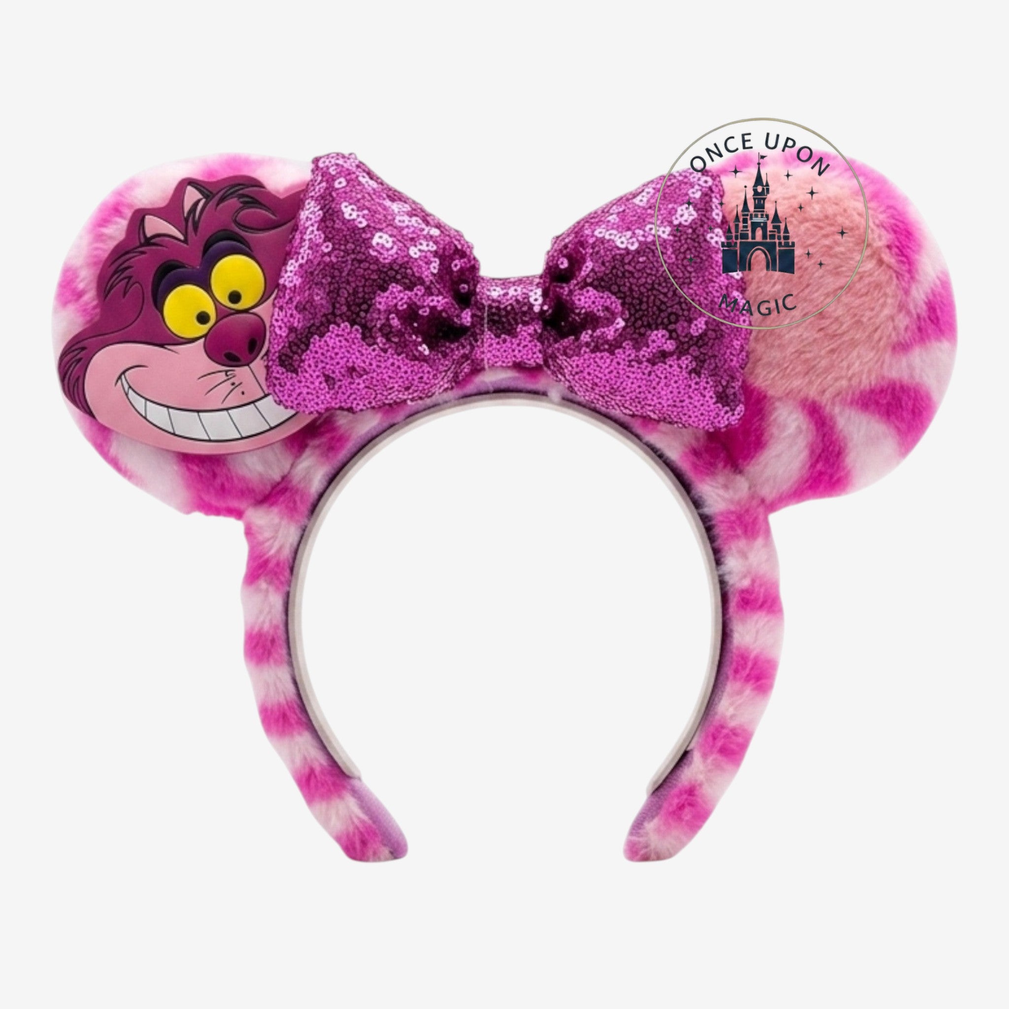 Once Upon Magic Cheshire Cat headband with pink and white striped fuzzy ears and a sparkly purple sequin bow.
