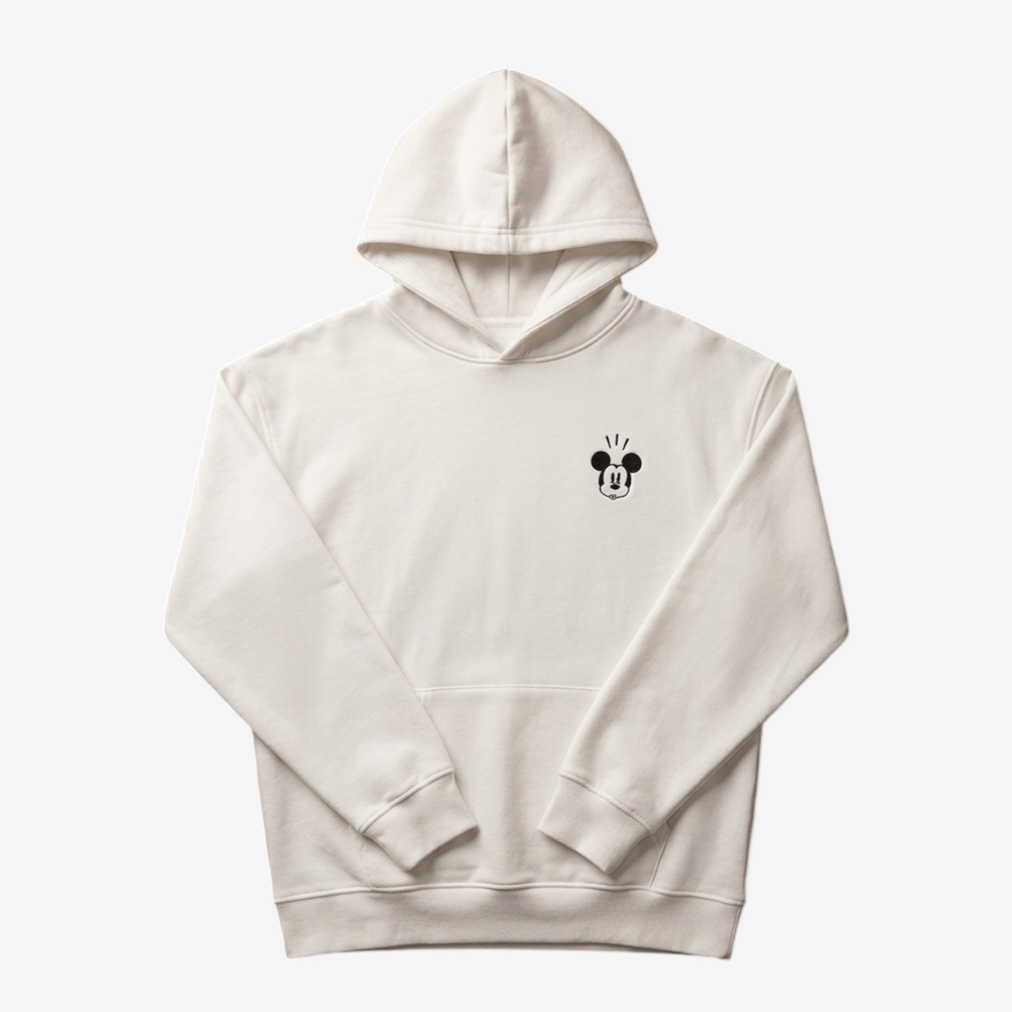Once Upon Magic cream-colored cotton hoodie with a small Mickey Mouse graphic on the left chest. Relaxed fit with hood and front pocket.
