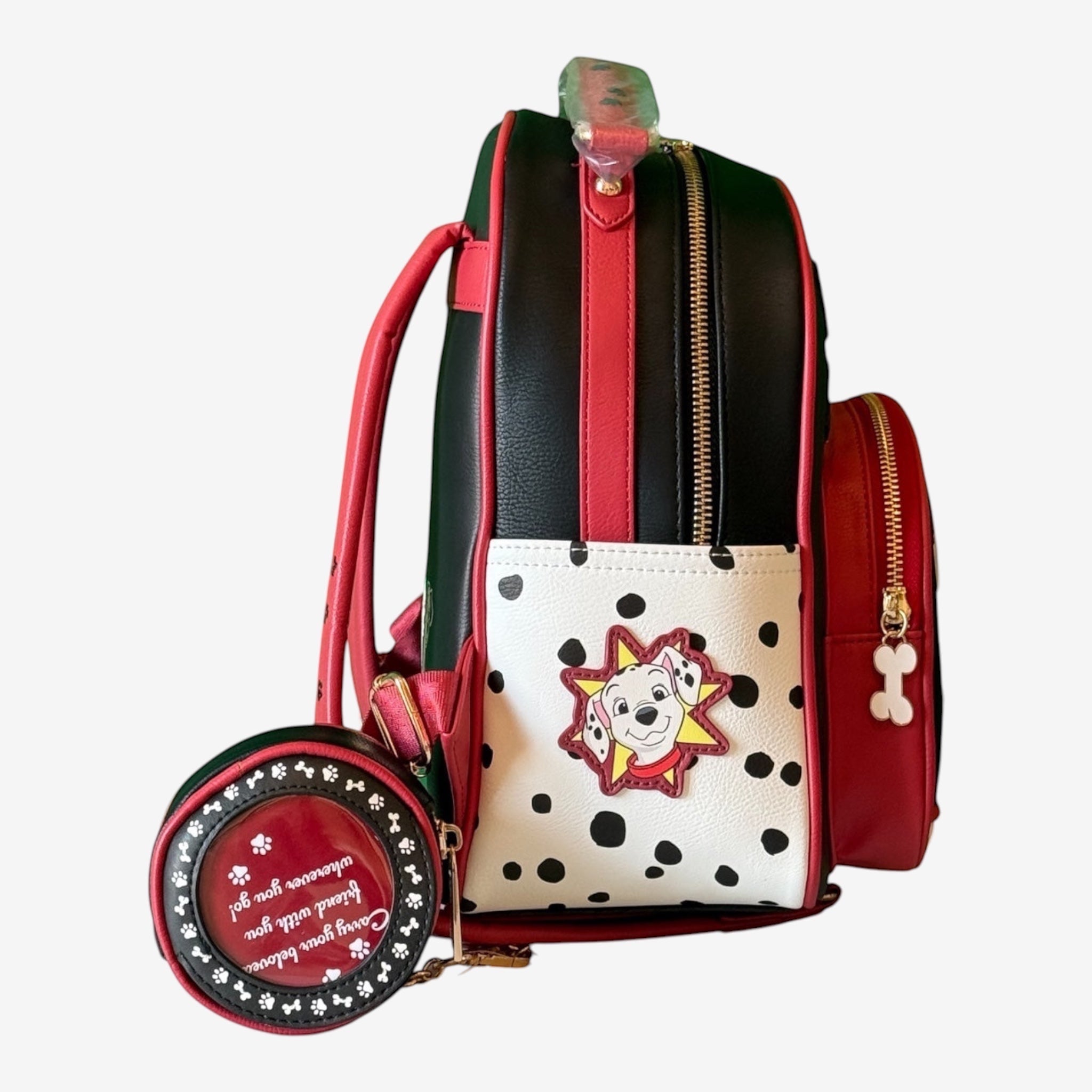 Once Upon Magic Dalmatian Friends backpack in black, red, and white faux leather with polka dots and a Dalmatian dog patch. Includes matching coin purse.