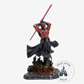 Once Upon Magic exclusive Darth Maul figurine from Star Wars, featuring red and black Sith tattoos, a double red lightsaber, and black robes.