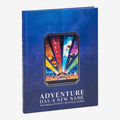 Once Upon Magic book cover for "Adventure Has A New Name: The Making of Disney Adventure World" featuring colorful comic-style panels.