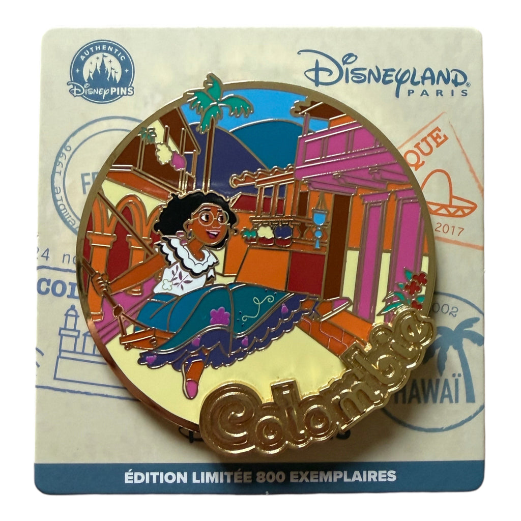 Once Upon Magic Disneyland Paris limited edition pin featuring Mirabel from Encanto on a swing in a colorful Colombian village.