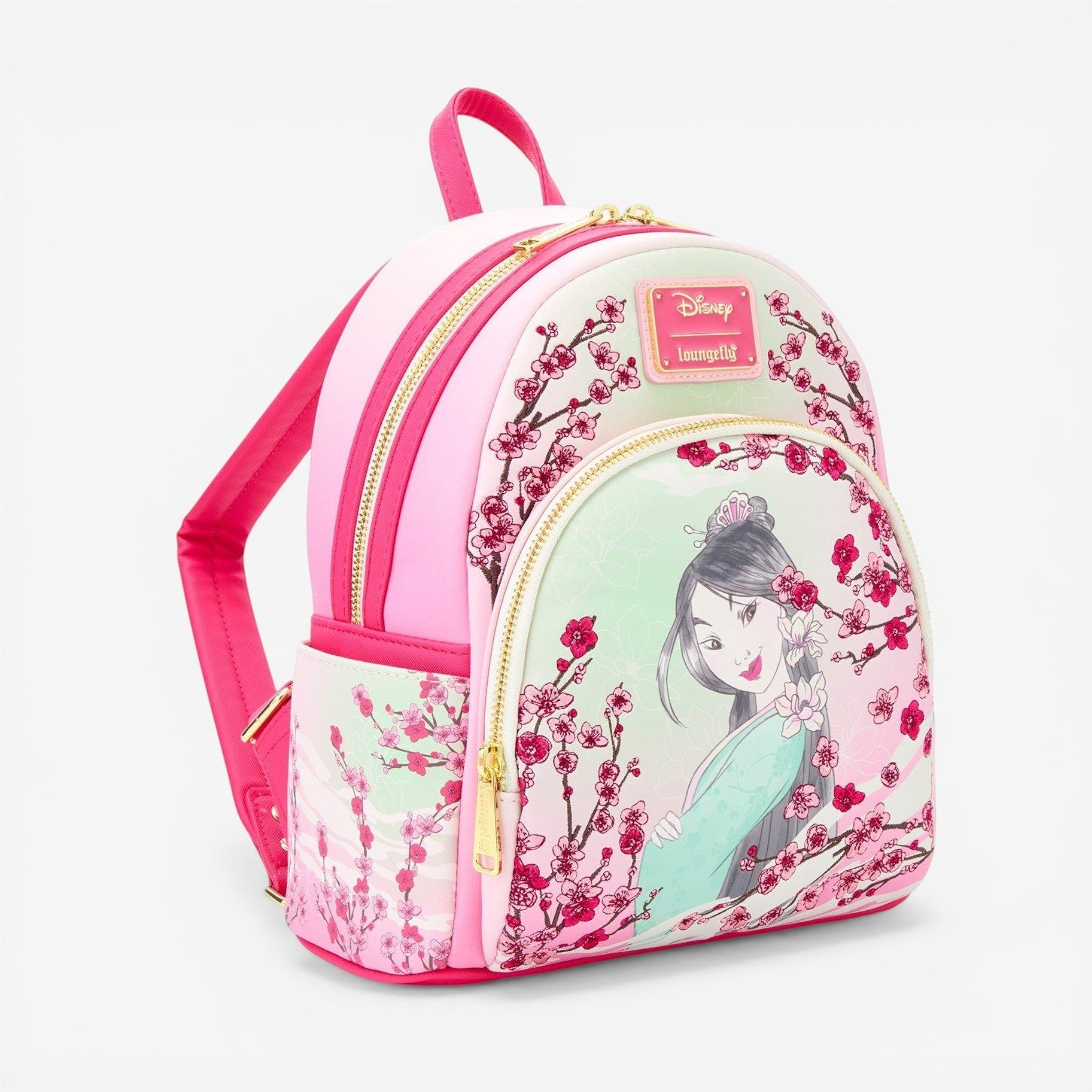 Once Upon Magic Disney Mulan cherry blossom mini backpack, pink polyurethane with Mulan illustration and gold hardware.