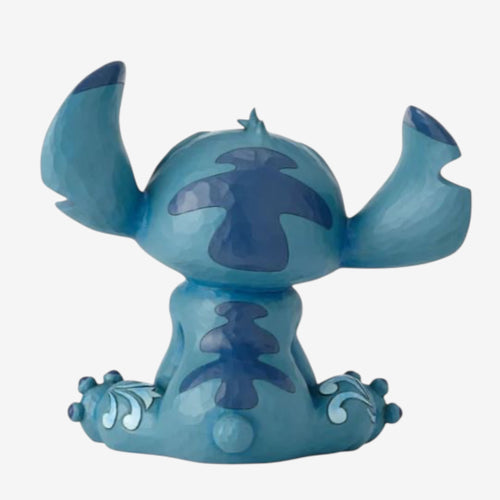 Once Upon Magic Disney Traditions by Jim Shore blue Stitch figurine with folk art details, sitting pose.
