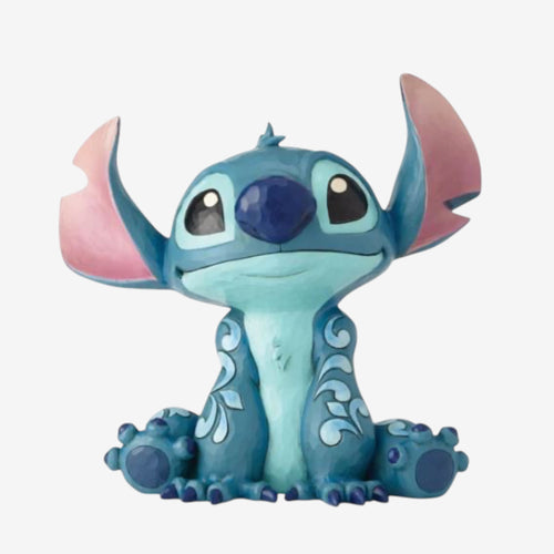 Once Upon Magic Disney Traditions by Jim Shore blue Stitch figurine with folk art details, sitting pose.