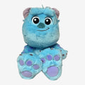 Once Upon Magic blue plush Sully from Monsters Inc. with large purple paws and spotted fur.