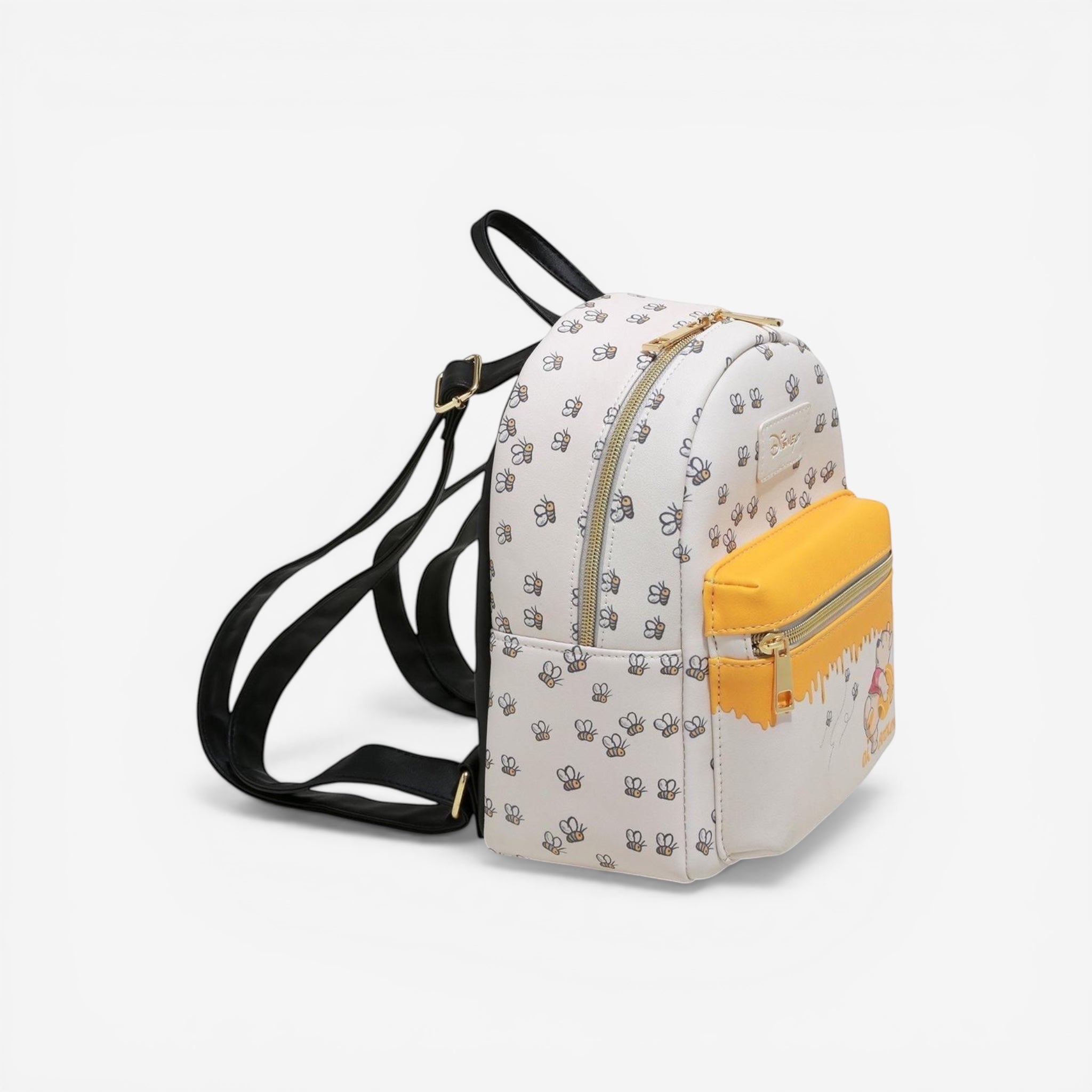 Once Upon Magic Disney Winnie the Pooh bees and honey mini backpack. White polyurethane with all-over bee print and yellow honey pot pocket.