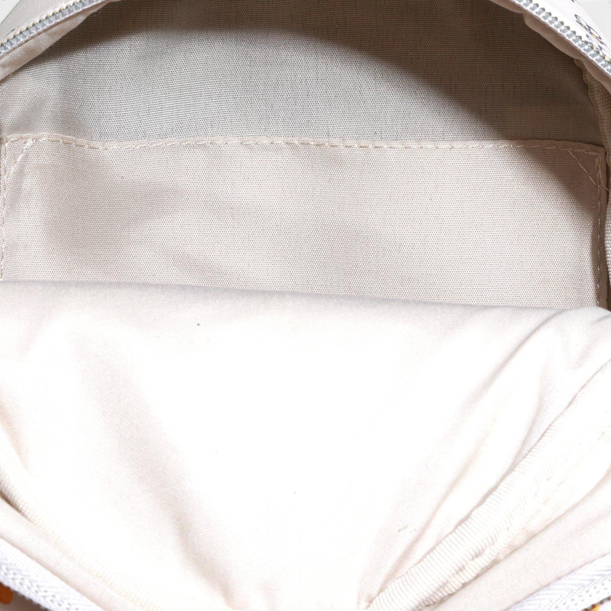 Once Upon Magic Disney Winnie the Pooh honey bee mini backpack interior. Beige lining with slip pocket.
