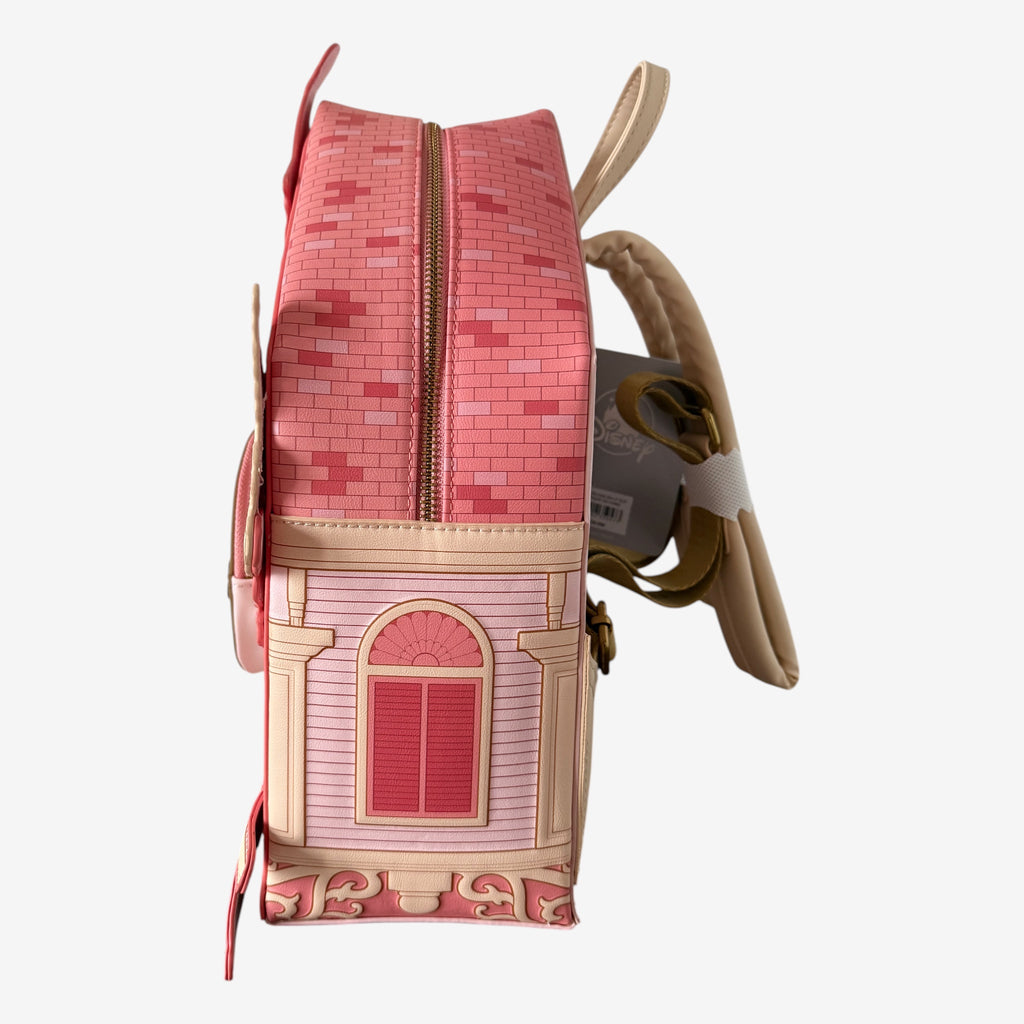 Once Upon Magic Disneyland Hotel Mickey Mouse clock backpack in pink faux leather with architectural details and a window.
