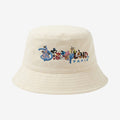 Once Upon Magic cream cotton bucket hat with embroidered Disneyland Paris logo and characters.