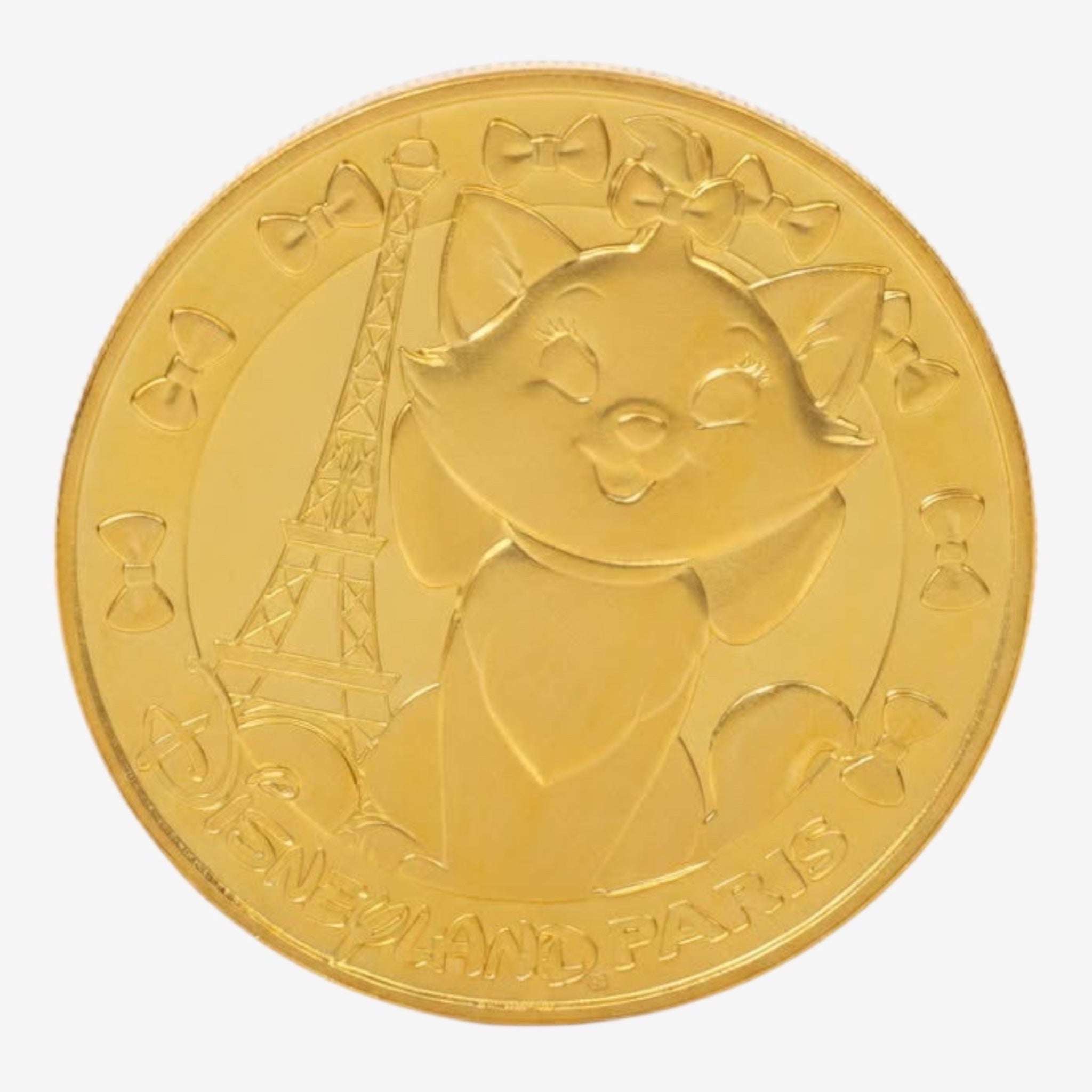 Once Upon Magic gold-tone souvenir medal featuring Marie from The Aristocats with the Eiffel Tower and Disneyland Paris text.