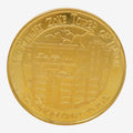 Once Upon Magic gold metal souvenir medal featuring The Twilight Zone Tower of Terror at Disneyland Paris