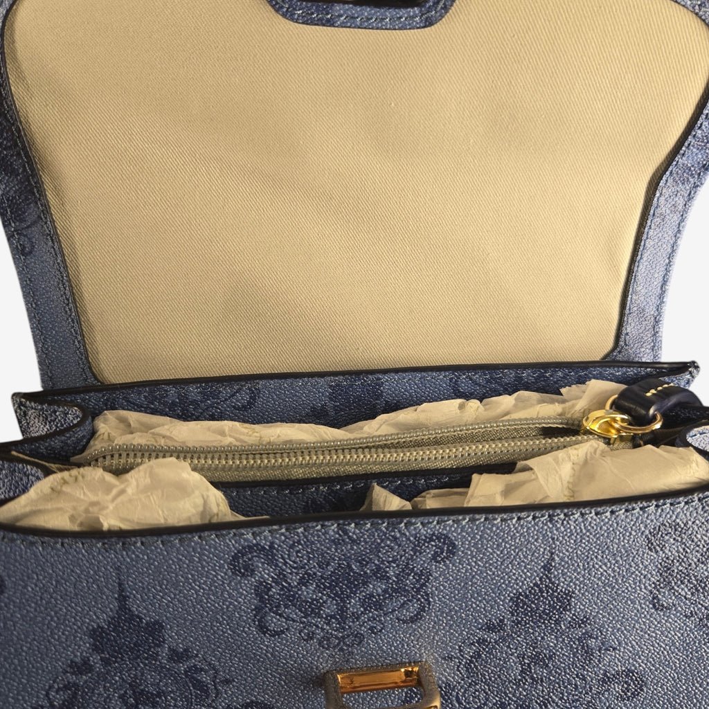 Dooney & Bourke Disneyland Hotel limited edition crossbody bag in midnight blue with baroque print and gold hardware.