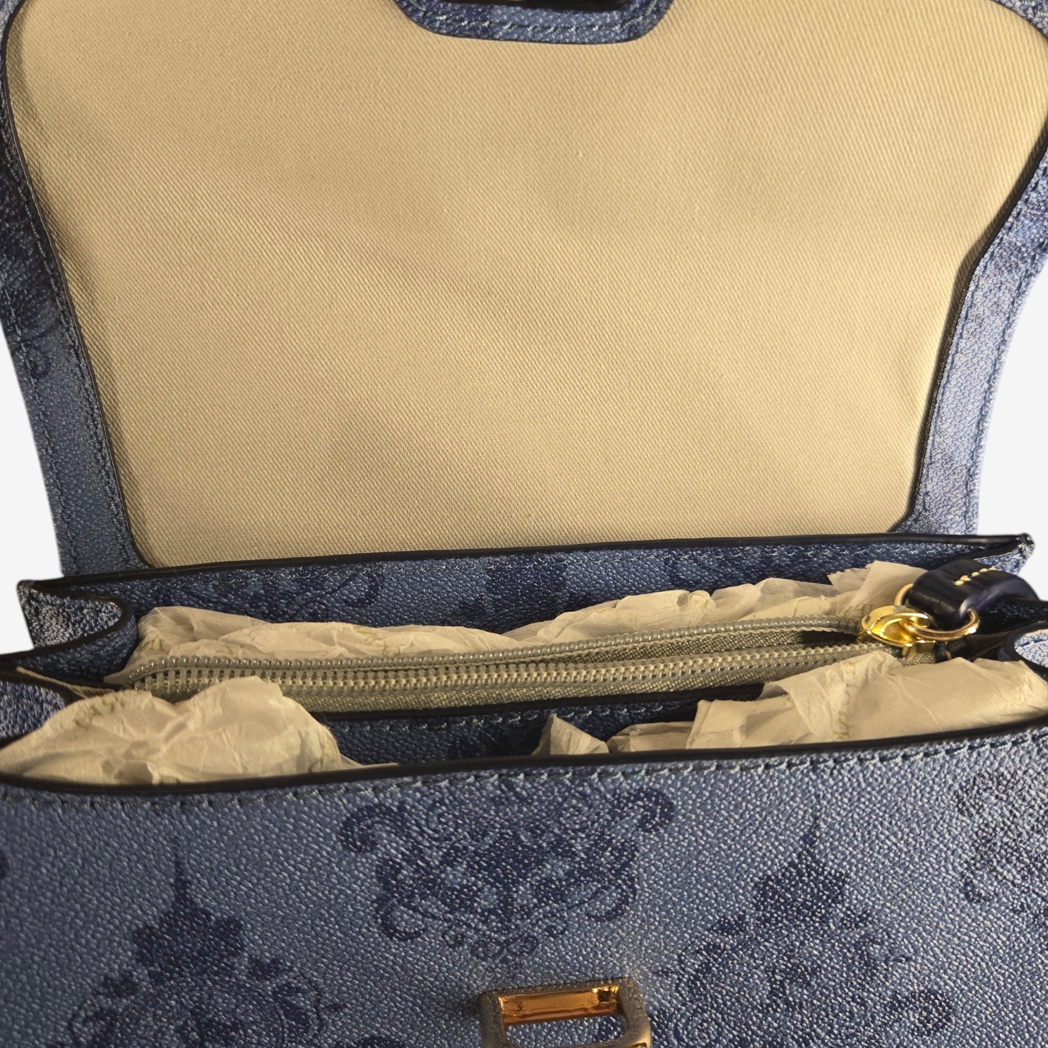 Dooney & Bourke Disneyland Hotel limited edition crossbody bag in midnight blue with baroque print and gold hardware.