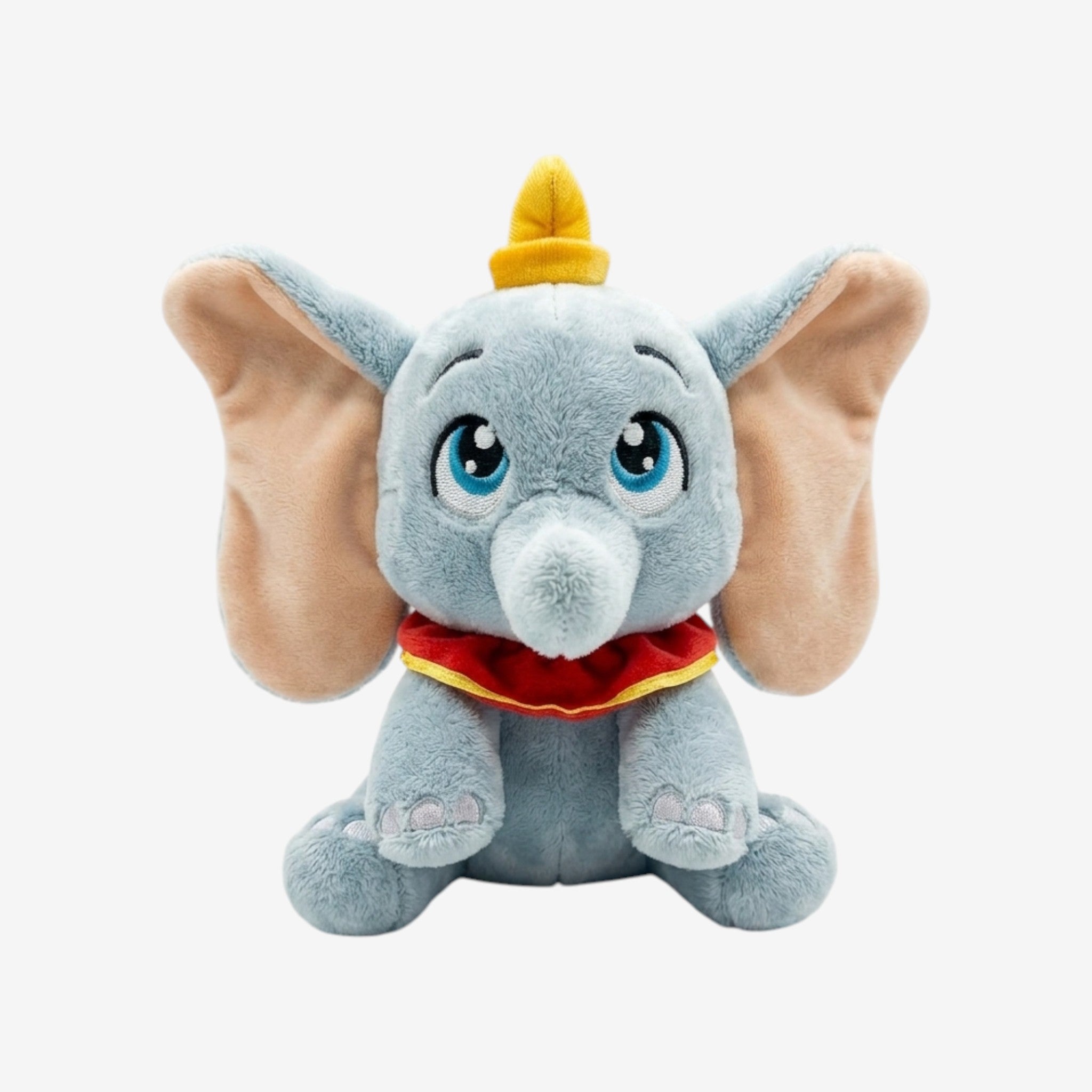 Once Upon Magic Dumbo the Flying Elephant plush toy, soft blue plush with large ears, blue eyes, yellow hat, and red collar.