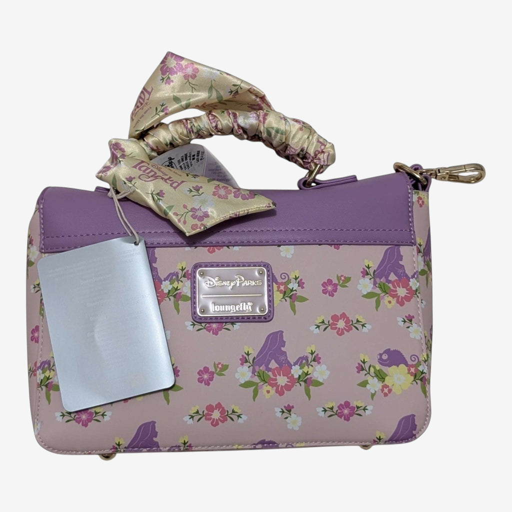 Once Upon Magic lavender and pink floral crossbody bag with sun emblem and silky scarf handle, inspired by Disney's Tangled.