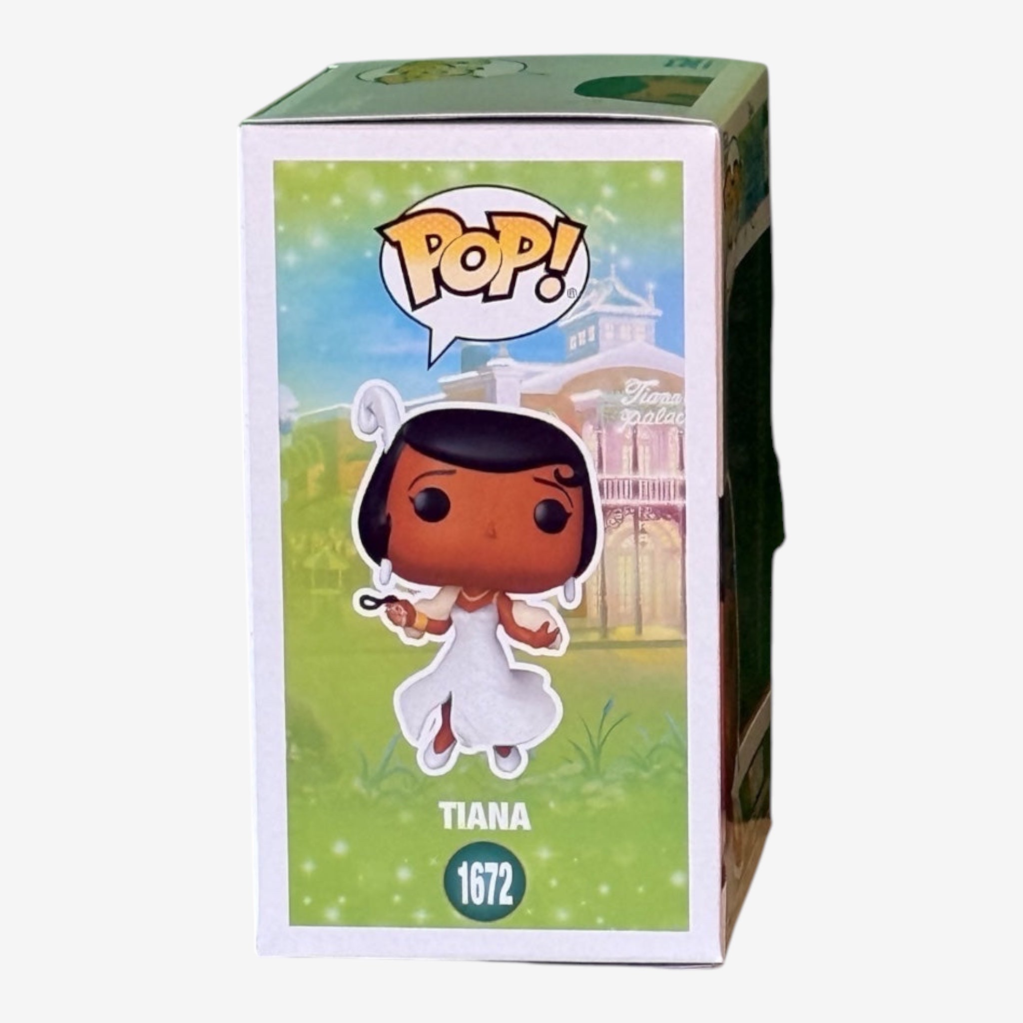 Once Upon Magic Funko Pop Tiana 1672 figure in white dress with tiara, holding a flower.