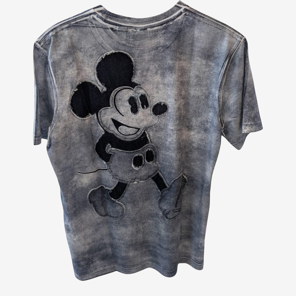 Once Upon Magic grey tie-dye t-shirt with a black graphic of Mickey Mouse walking. Short sleeves, crew neck.