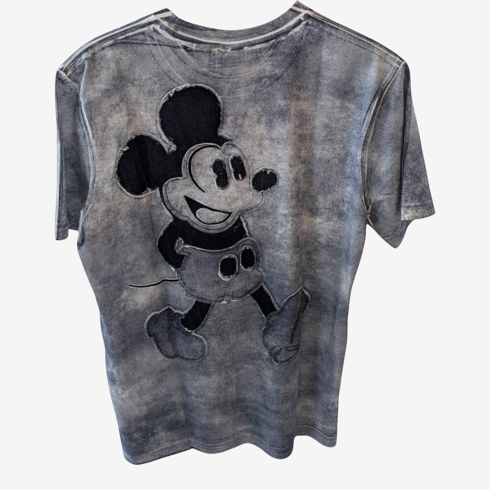 Once Upon Magic grey tie-dye t-shirt with a black graphic of Mickey Mouse walking. Short sleeves, crew neck.