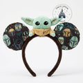 Once Upon Magic Grogu plush ear headband with Mandalorian helmet pattern on fuzzy ears. A fun Star Wars accessory.