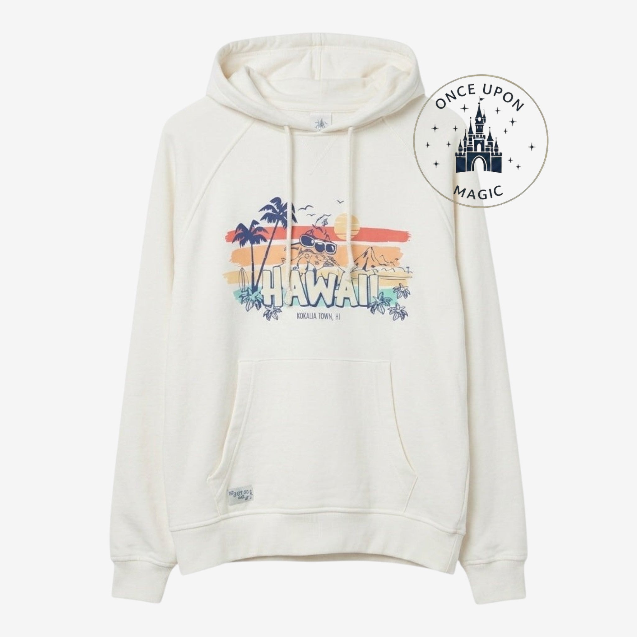 Once Upon Magic cream cotton hoodie with a colorful "Hawaii" graphic featuring Stitch, palm trees, and a sunset. Adjustable hood and kangaroo pocket.