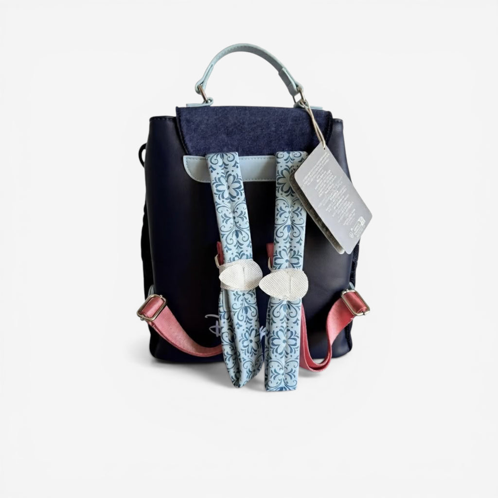 Once Upon Magic Loungefly Frozen mini backpack with blue floral print straps and pink accents. Features Anna and Elsa inspired embroidery.