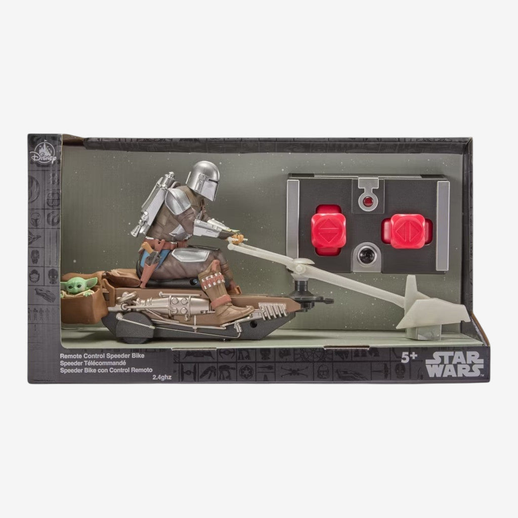 Once Upon Magic Star Wars Mandalorian Speeder Bike with Grogu remote control toy. Features Mandalorian figure driving, Grogu in basket, and red button remote.