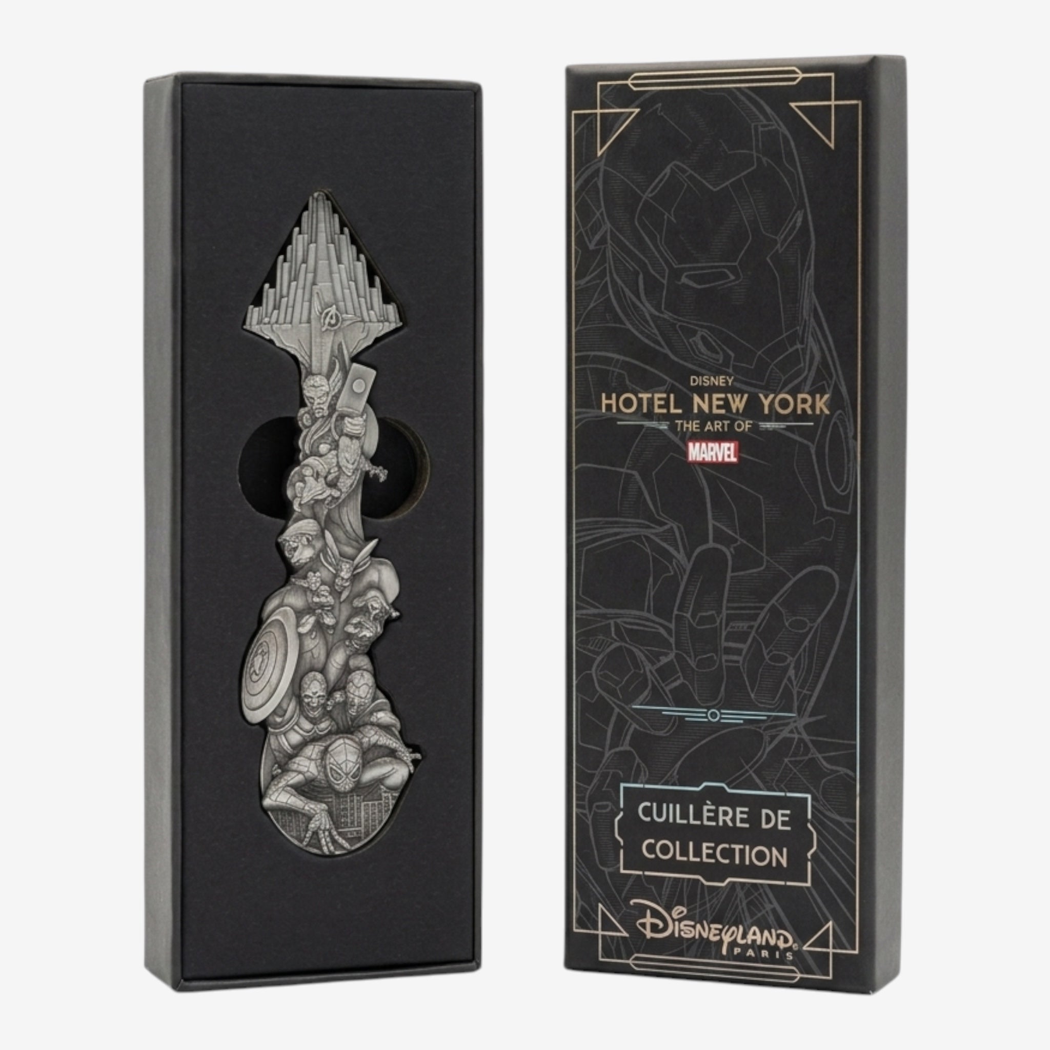 Once Upon Magic collector spoon featuring Marvel Avengers characters in relief, presented in a black box with Avengers Campus design.
