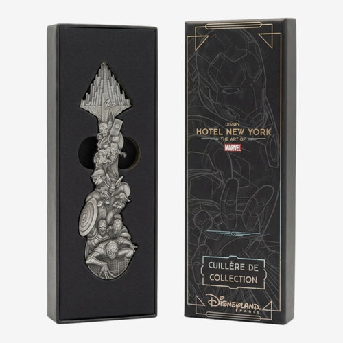 Once Upon Magic collector spoon featuring Marvel Avengers characters in relief, presented in a black box with Avengers Campus design.