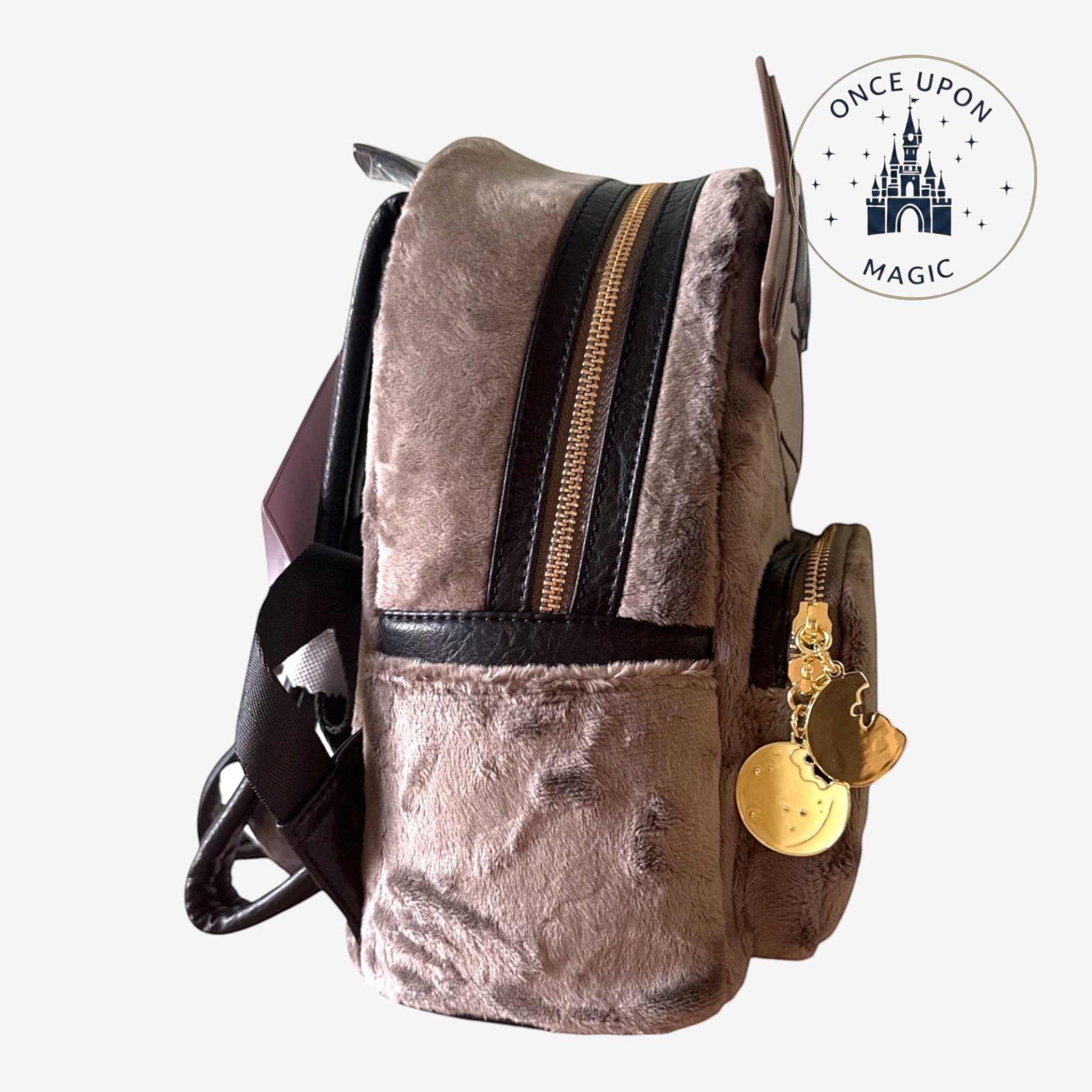 Once Upon Magic Meeko plush mini backpack in taupe with gold zipper and cookie charm.