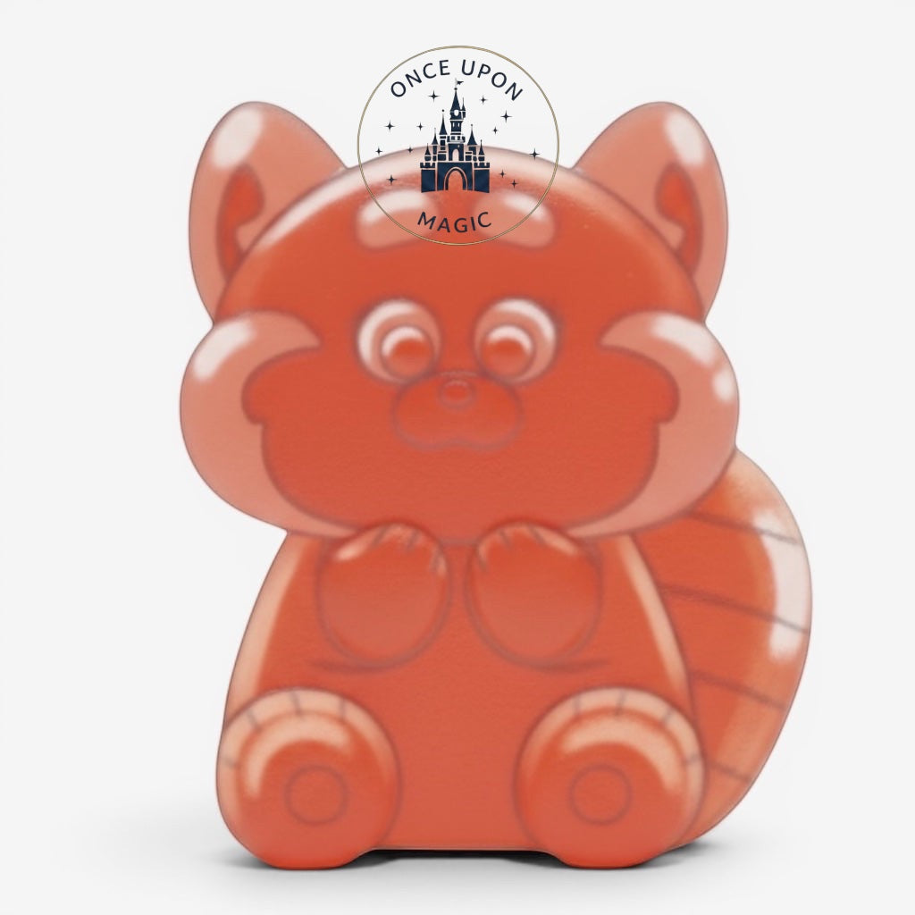 Once Upon Magic translucent peach Mei Lee gummy pin from Turning Red, sitting pose with cute features.