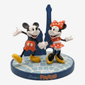 Once Upon Magic Disneyland Paris figurine of Mickey and Minnie Mouse holding hands in front of a blue Eiffel Tower on a cobblestone base.