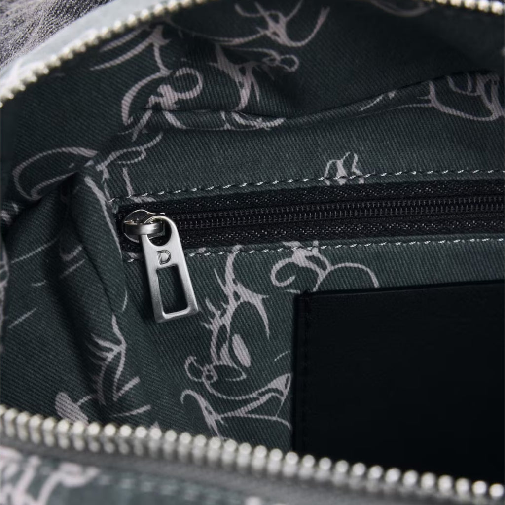 Once Upon Magic Mickey Mouse backpack interior with charcoal grey lining and a zip pocket. Features a subtle Mickey Mouse pattern.