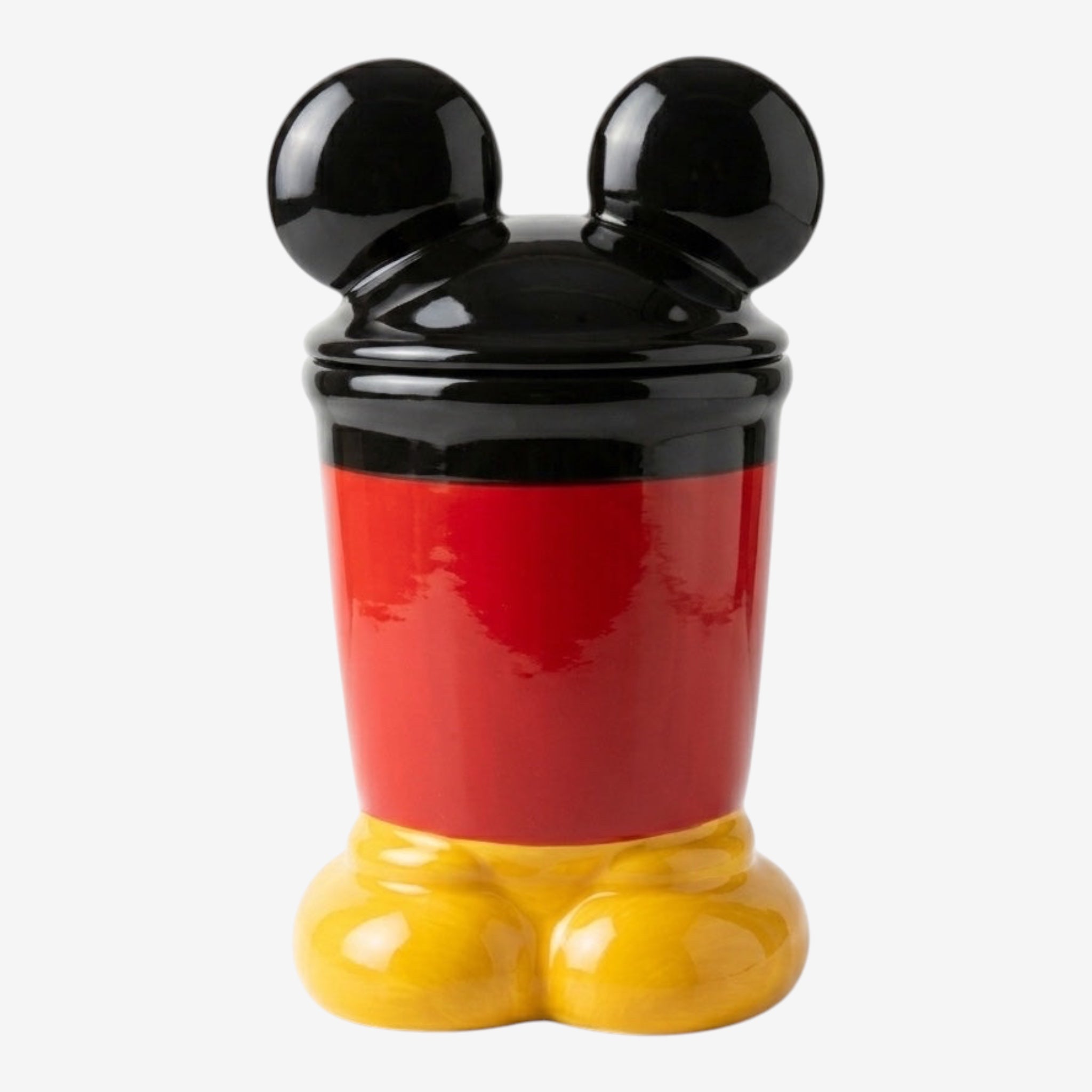 Once Upon Magic Mickey Mouse inspired ceramic treat jar in red, yellow, and black, featuring Mickey's ears, shorts, and shoes.